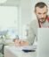 Small business owner analyzing financial data in his business to improve cash flow